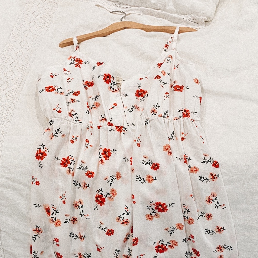 A white long floral dress perfect for the summer.